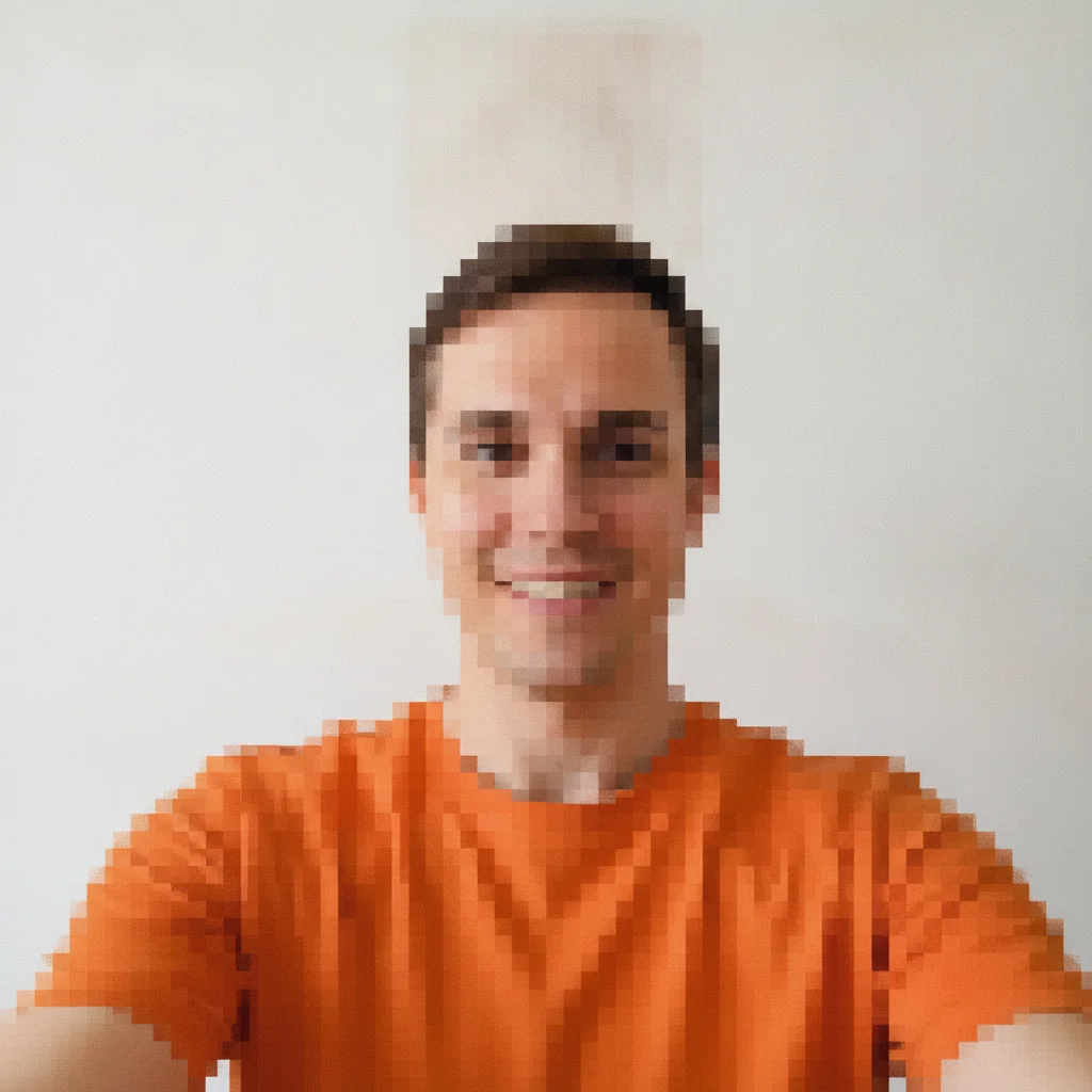 The same selfie pixelated into large square blocks for a Minecraft-style portrait, with a soft blurred patch remaining above the hairline.