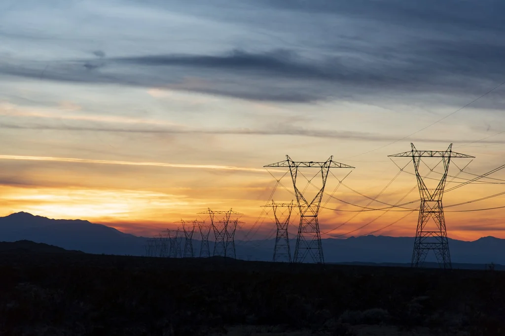 Before: power lines across a landscape - unedited source photograph (Public domain)