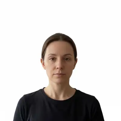 Same photo after AI passport photo maker formatted it to US specs with white background