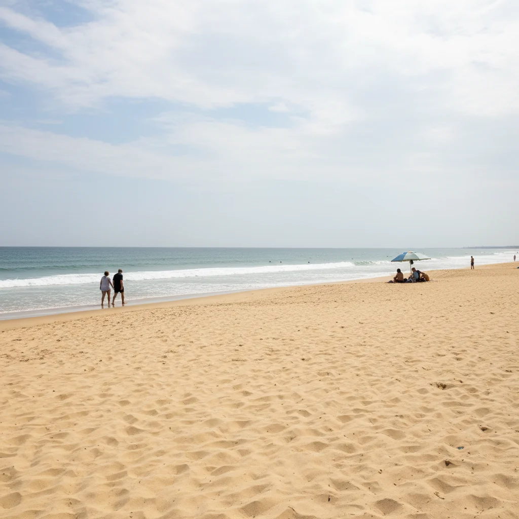 Beach photo with strangers walking in the background