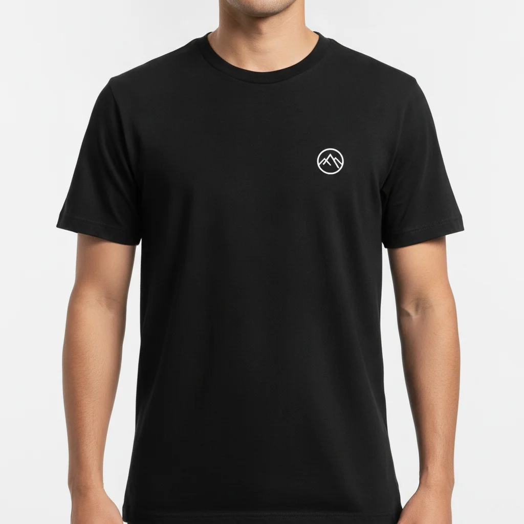 Person in black t-shirt with small white logo on chest